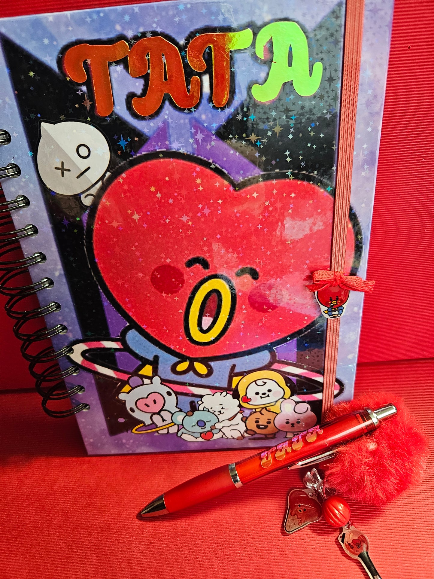 Cuaderno A5 +boligrafo Tata